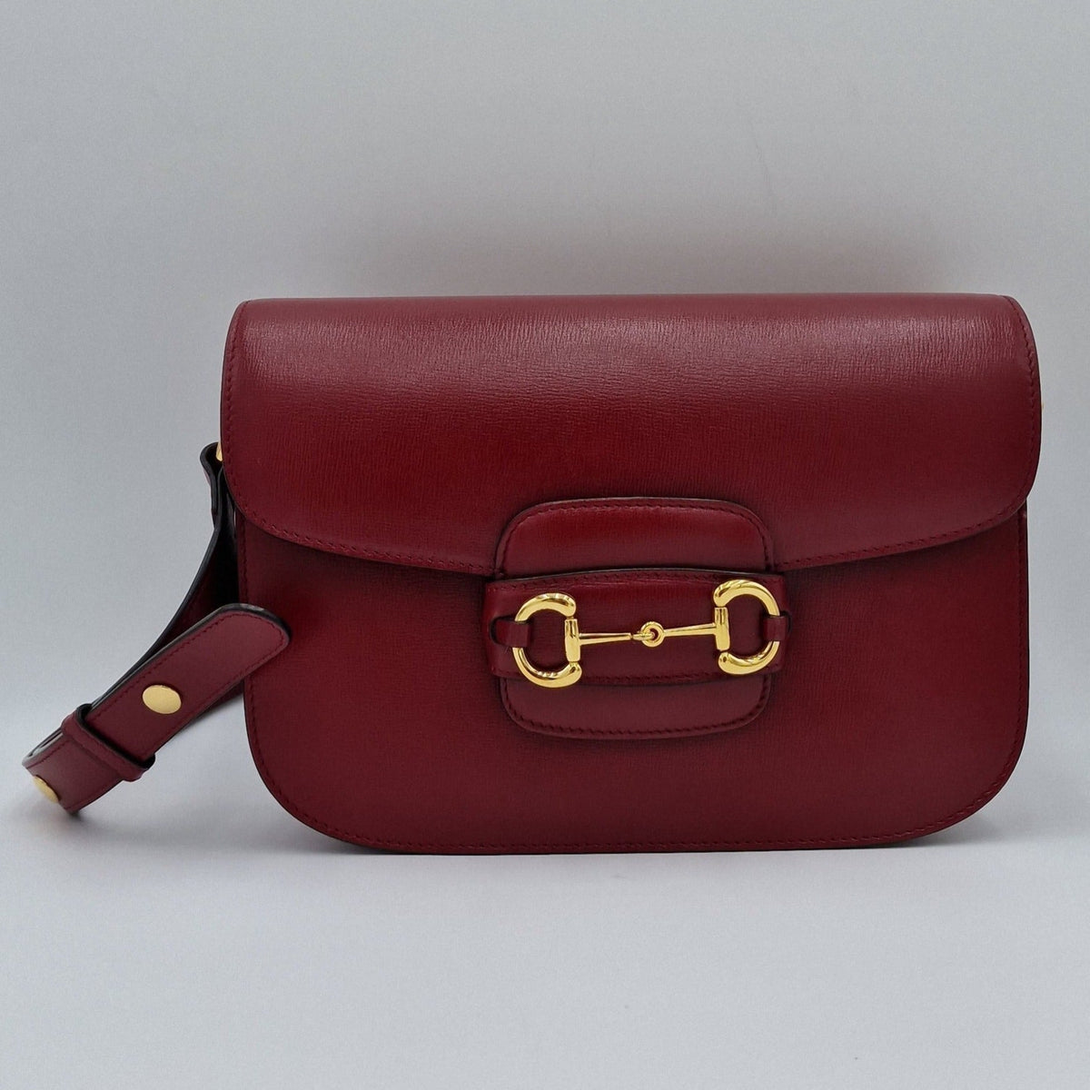 Gucci 1955 Horsebit Leather Shoulder Bag - Red in Red - detail view 4 showing the bag's shape, finish and visible design details.