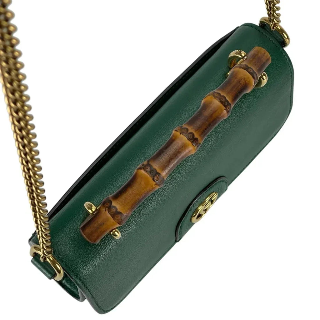 Gucci Diana Mini Top Handle Crossbody Bag - Green in Green - detail view 4 showing the bag's shape, finish and visible design details.