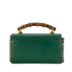 Gucci Diana Mini Top Handle Crossbody Bag - Green in Green - side view showing the bag's shape, finish and visible design details.
