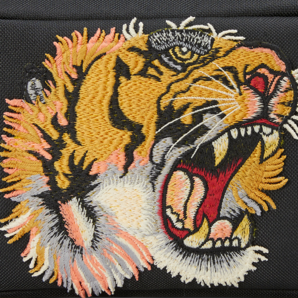 Gucci Black Tiger Nylon Messenger Bag - Black in Black - rear view showing the bag's shape, finish and visible design details.