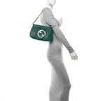 Gucci Blondie Small Shoulder Bag - Green in Green - detail view 8 showing the bag's shape, finish and visible design details.
