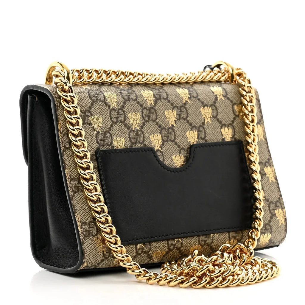 Gucci Bees Padlock Small Shoulder Bag - Beige in Beige - side view showing the bag's shape, finish and visible design details.