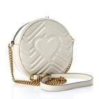 Gucci Azalea Marmont Round Mini Shoulder Bag - White in White - side view showing the bag's shape, finish and visible design details.