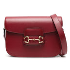 Gucci 1955 Horsebit Leather Shoulder Bag - Red in Red - front view showing the bag's shape, finish and visible design details.