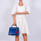 Hermes Kelly 28 Sellier Blue Electric Tadelakt, side view
