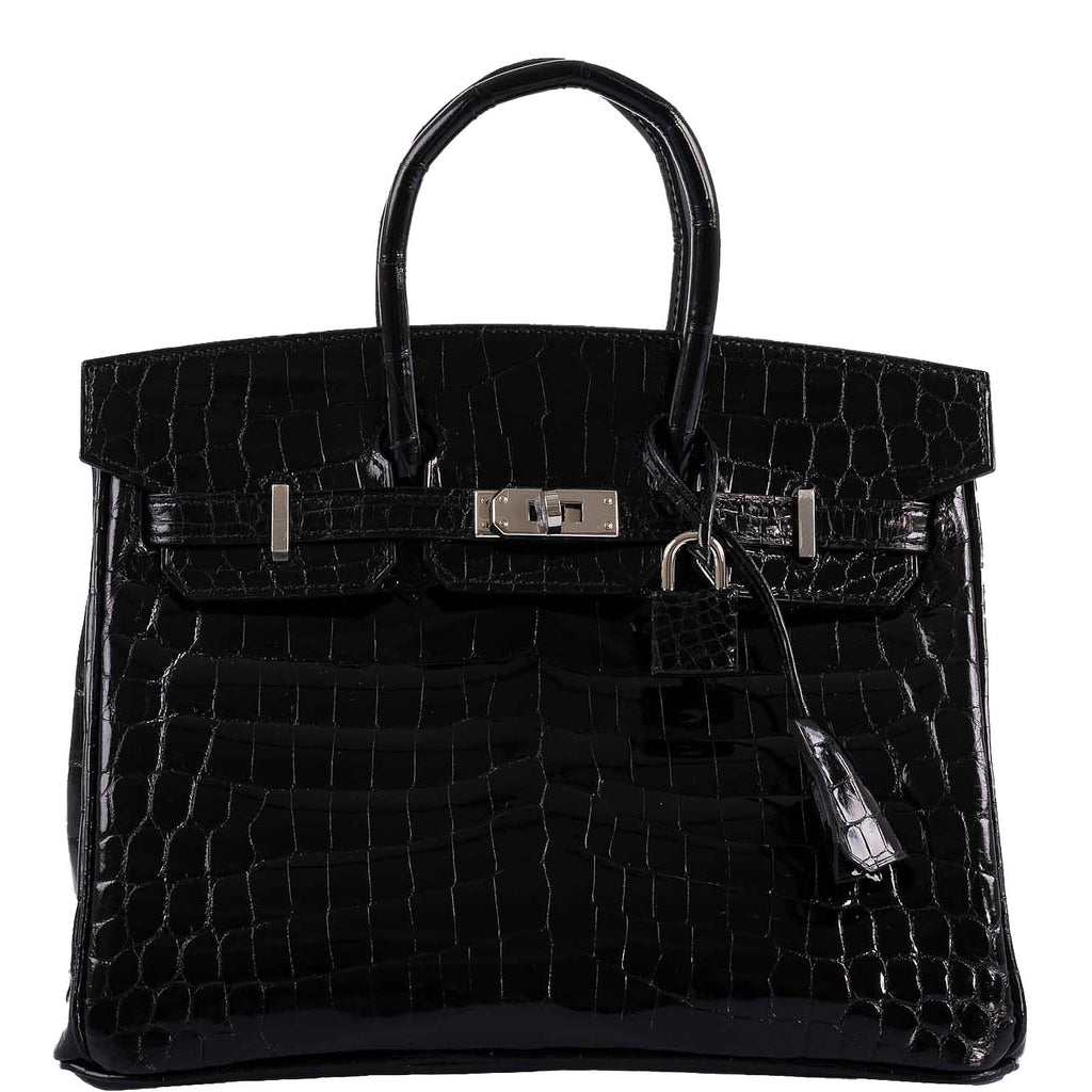 Front view of Birkin 25 in shiny black crocodile leather