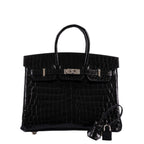 Lifestyle image featuring shiny black crocodile Birkin 25