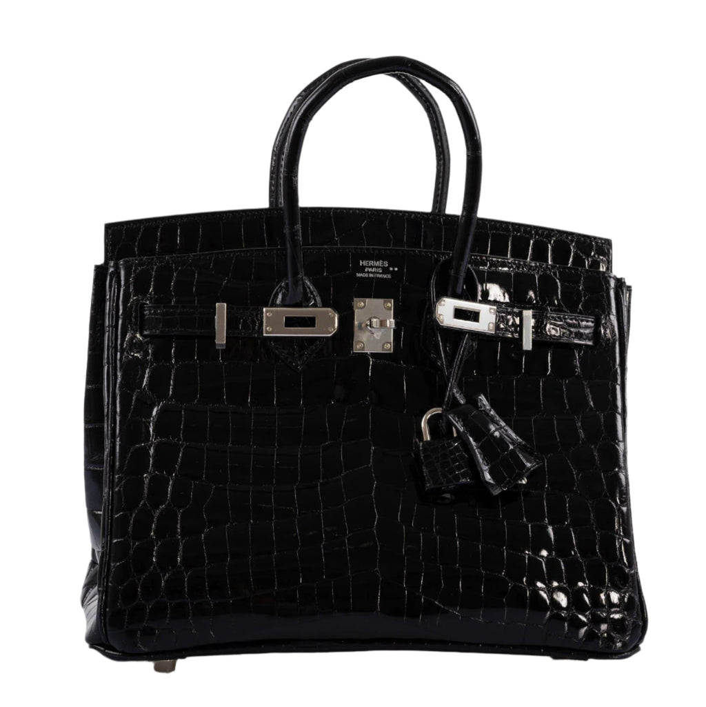 Close-up of palladium lock and strap on Birkin 25 crocodile bag