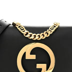 Gucci Blondie Shoulder Bag - Black in Black - rear view showing the bag's shape, finish and visible design details.