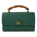 Gucci Diana Mini Top Handle Crossbody Bag - Green in Green - detail view 8 showing the bag's shape, finish and visible design details.