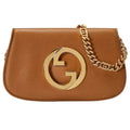 Gucci Blondie Shoulder Bag - Brown in Brown - front view showing the bag's shape, finish and visible design details.
