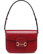 Gucci 1955 Horsebit Leather Shoulder Bag - Red in Red - side view showing the bag's shape, finish and visible design details.