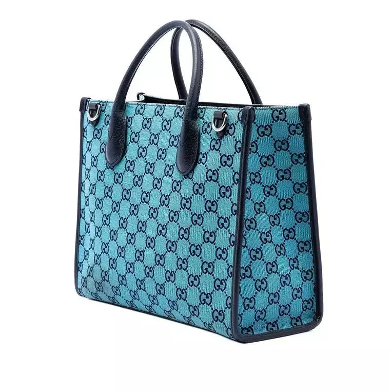 Gucci Calfskin Retro Tote Bag - Blue in Blue - side view showing the bag's shape, finish and visible design details.