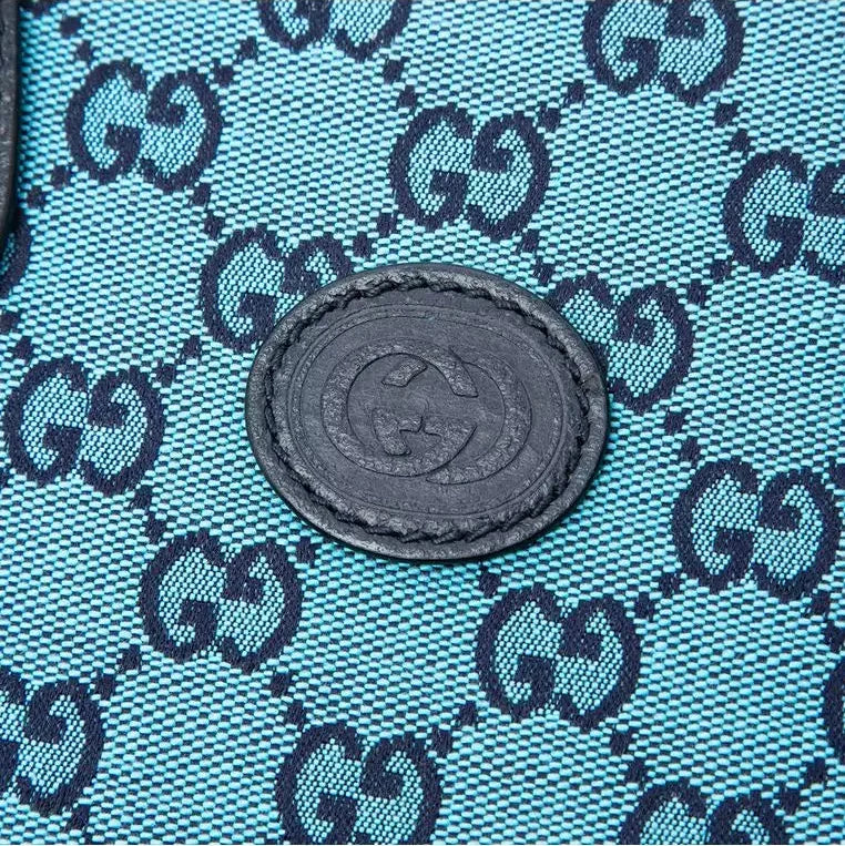 Gucci Calfskin Retro Tote Bag - Blue in Blue - detail view 4 showing the bag's shape, finish and visible design details.