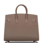 Side profile showing Sellier structure and gold hardware