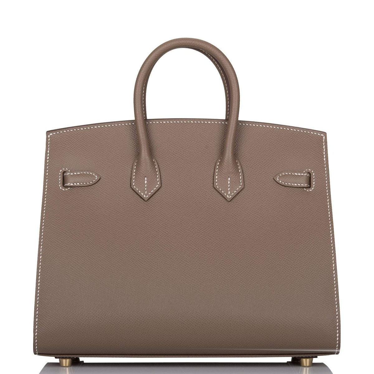 Side profile showing Sellier structure and gold hardware