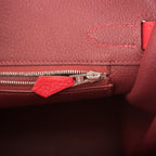 Detail of rolled handles on Hermes Birkin 30 Rouge Casaque