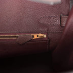 Rolled handle stitching detail on Hermes Birkin 30 red bag

