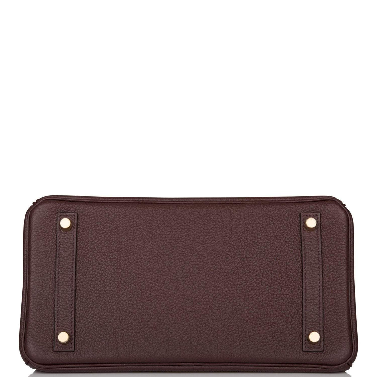 Chevre leather-lined interior with zip and slip pockets