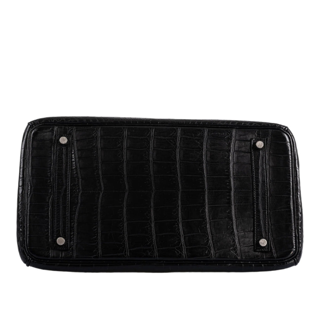 Open flap view showing inside of the exotic leather Birkin
