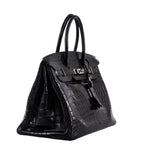 Detail of double rolled top handle on crocodile Birkin