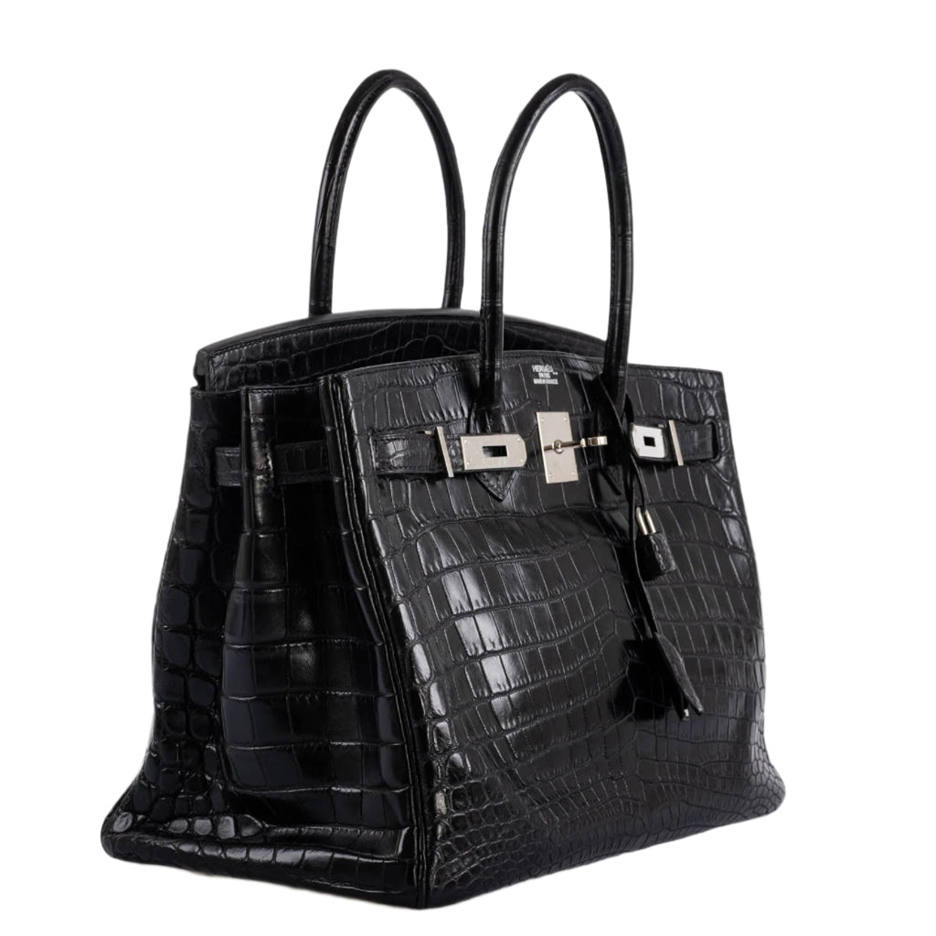 Hermes Birkin 35 matte crocodile bag placed elegantly on display table