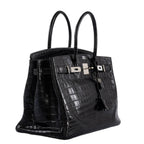 Hermes Birkin 35 matte crocodile bag placed elegantly on display table