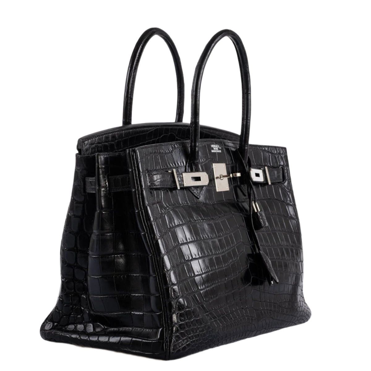 Hermes Birkin 35 matte crocodile bag placed elegantly on display table