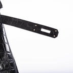 Palladium lock attached to matte black crocodile Birkin