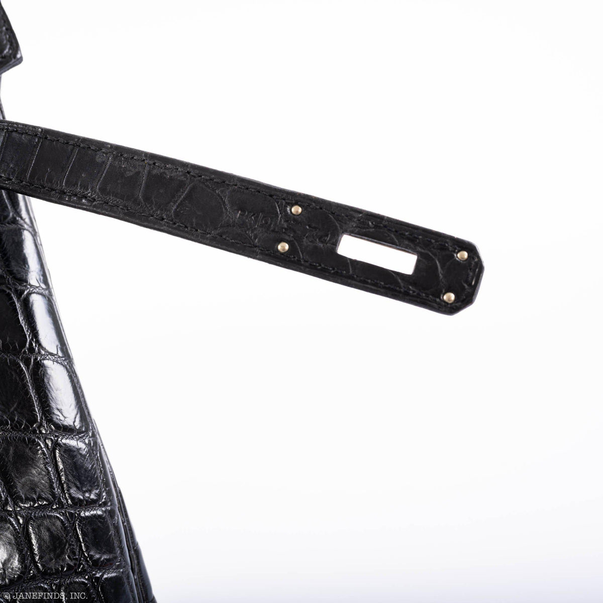 Palladium lock attached to matte black crocodile Birkin