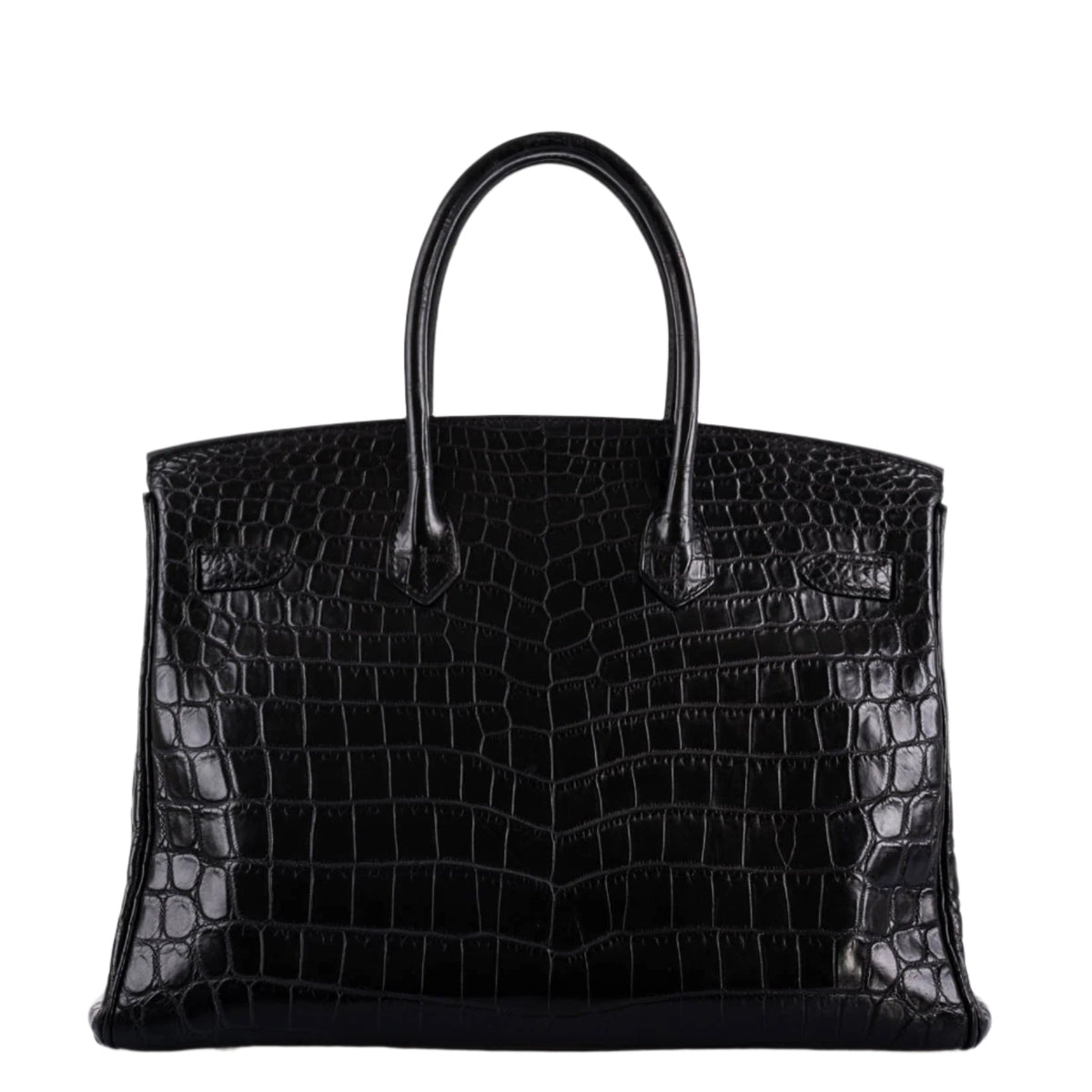 Birkin 35 in crocodile leather placed inside Hermes dustbag