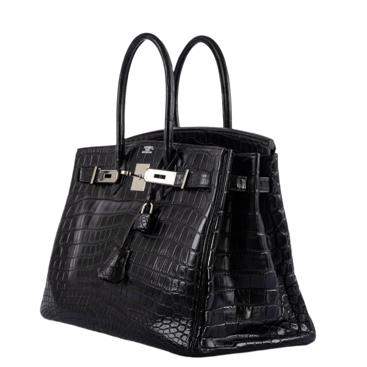 Detailed close-up of top handle stitching on black crocodile Birkin