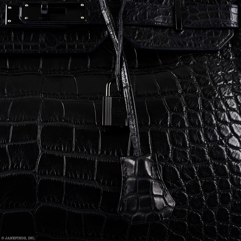 Bottom view of Birkin 35 showing protective studs and grain texture