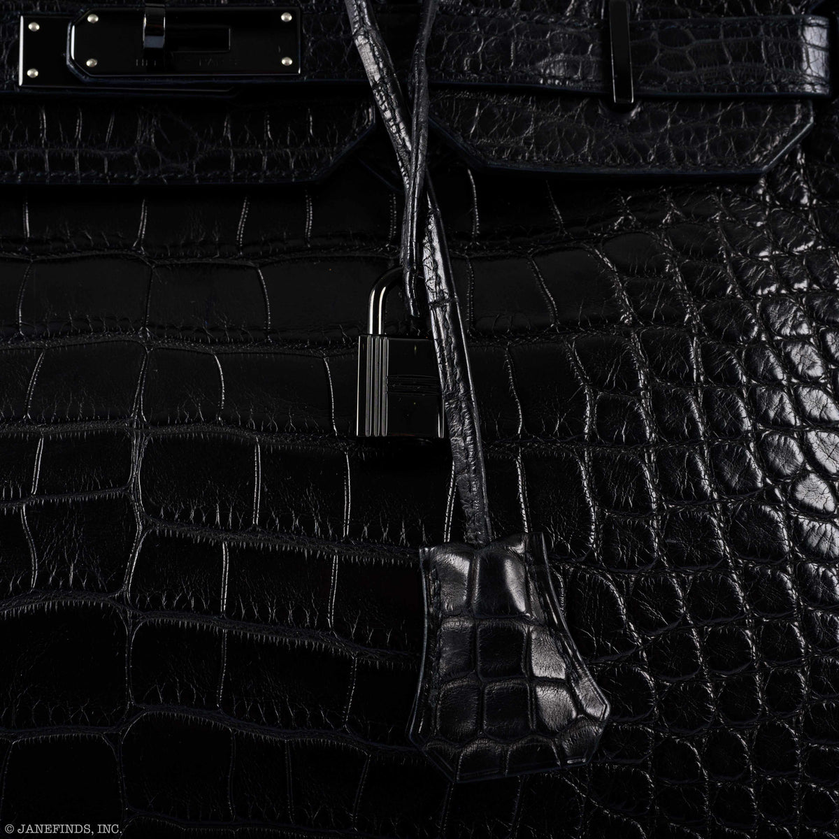 Bottom view of Birkin 35 showing protective studs and grain texture