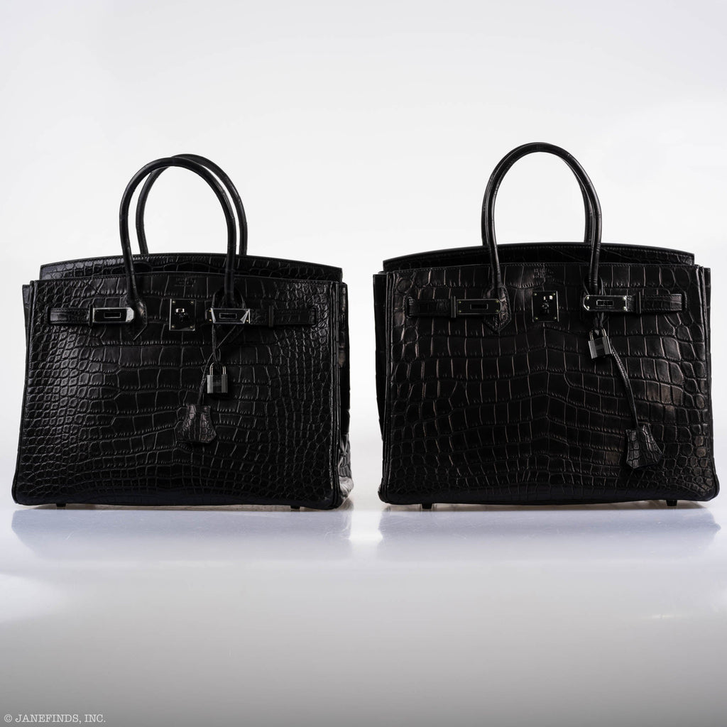 Flatlay of Hermes Birkin 35 SO BLACK with accessories including dustbag and lock