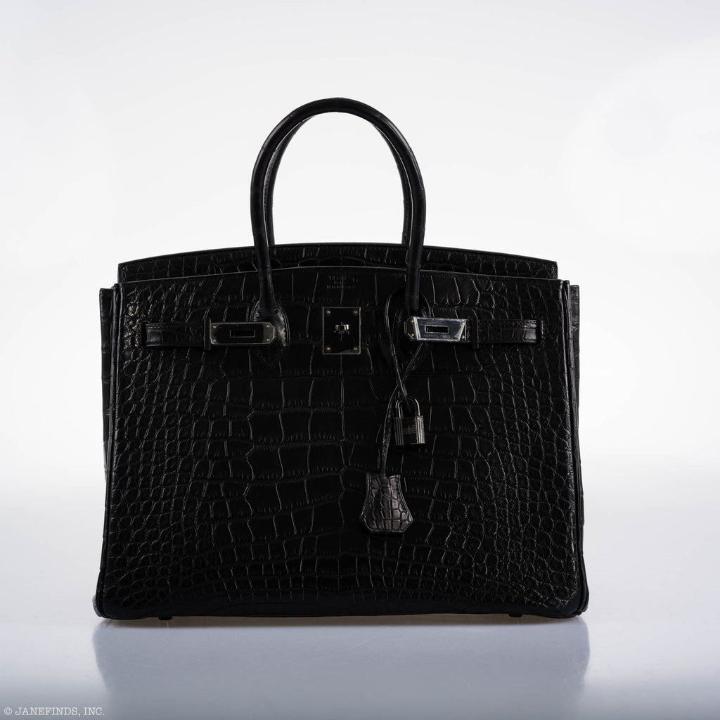 Display shot of SO BLACK Birkin 35 with structured silhouette