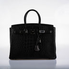 Display shot of SO BLACK Birkin 35 with structured silhouette