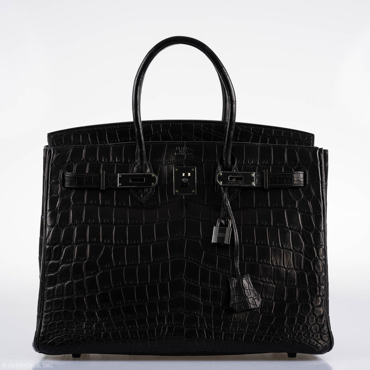 Macro view of matte alligator texture on Hermes Birkin

