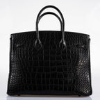 Open flap view showing clasp and matte interior leather