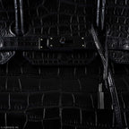 Side angle showing depth and structure of matte alligator leather