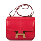 Front view of Hermes Constance 24 Rouge Exotique in lizard leather