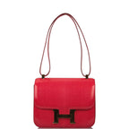 Hermes Constance 24 Rouge Exotique styled on model