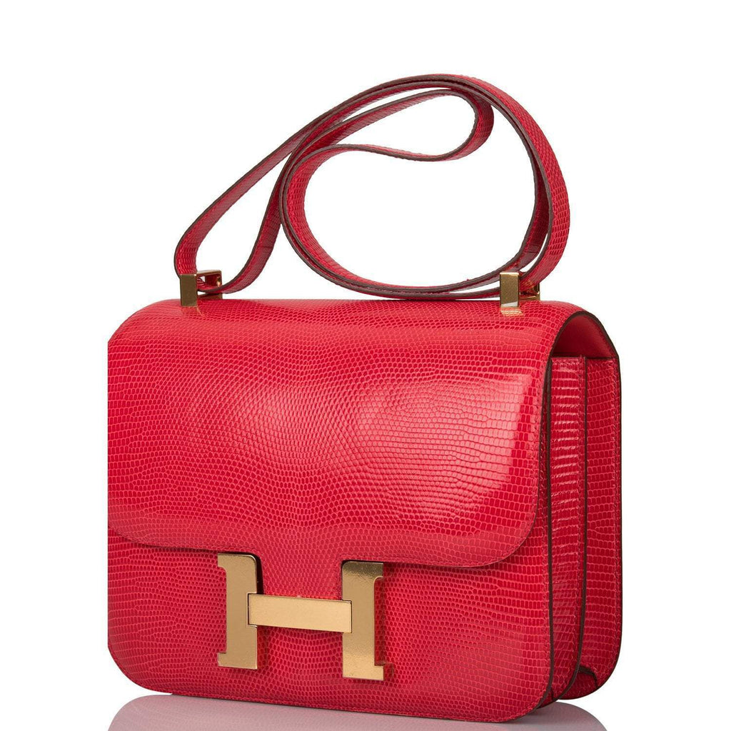 Adjustable strap on Hermes Rouge Exotique Lizard Constance 24
