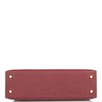 Interior slip pocket in Rouge H lambskin lining