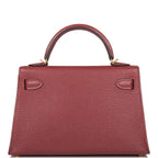 Top handle and flap detail on Mini Kelly 20 Rouge H