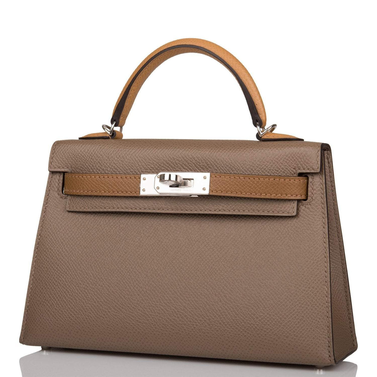 Side profile of Mini Kelly 20 in brown Epsom leather with palladium hardware