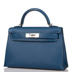Open flap revealing Bleu Izmir lambskin interior