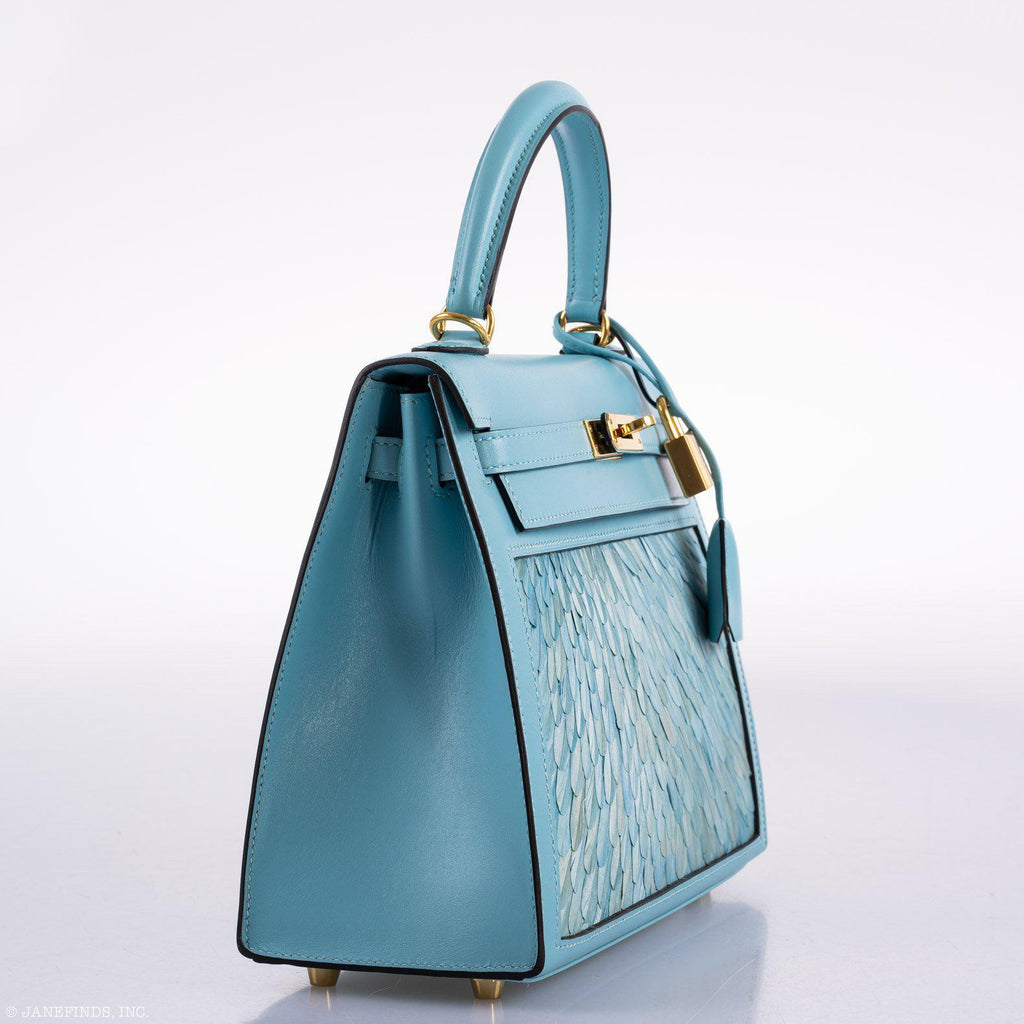 Close-up of custom feather panel on Hermes Kelly 25 with ombré rooster feathers