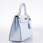 A side profile of the Hermes Kelly 25, highlighting its sharp silhouette