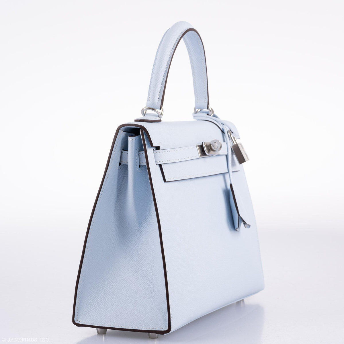 A side profile of the Hermes Kelly 25, highlighting its sharp silhouette